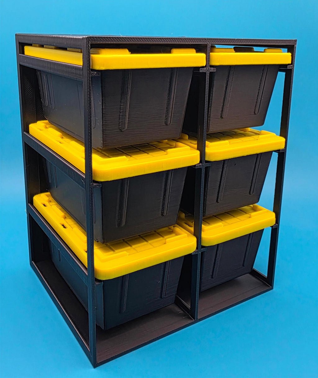 A black and yellow storage container with six compartments, designed to hold various items.