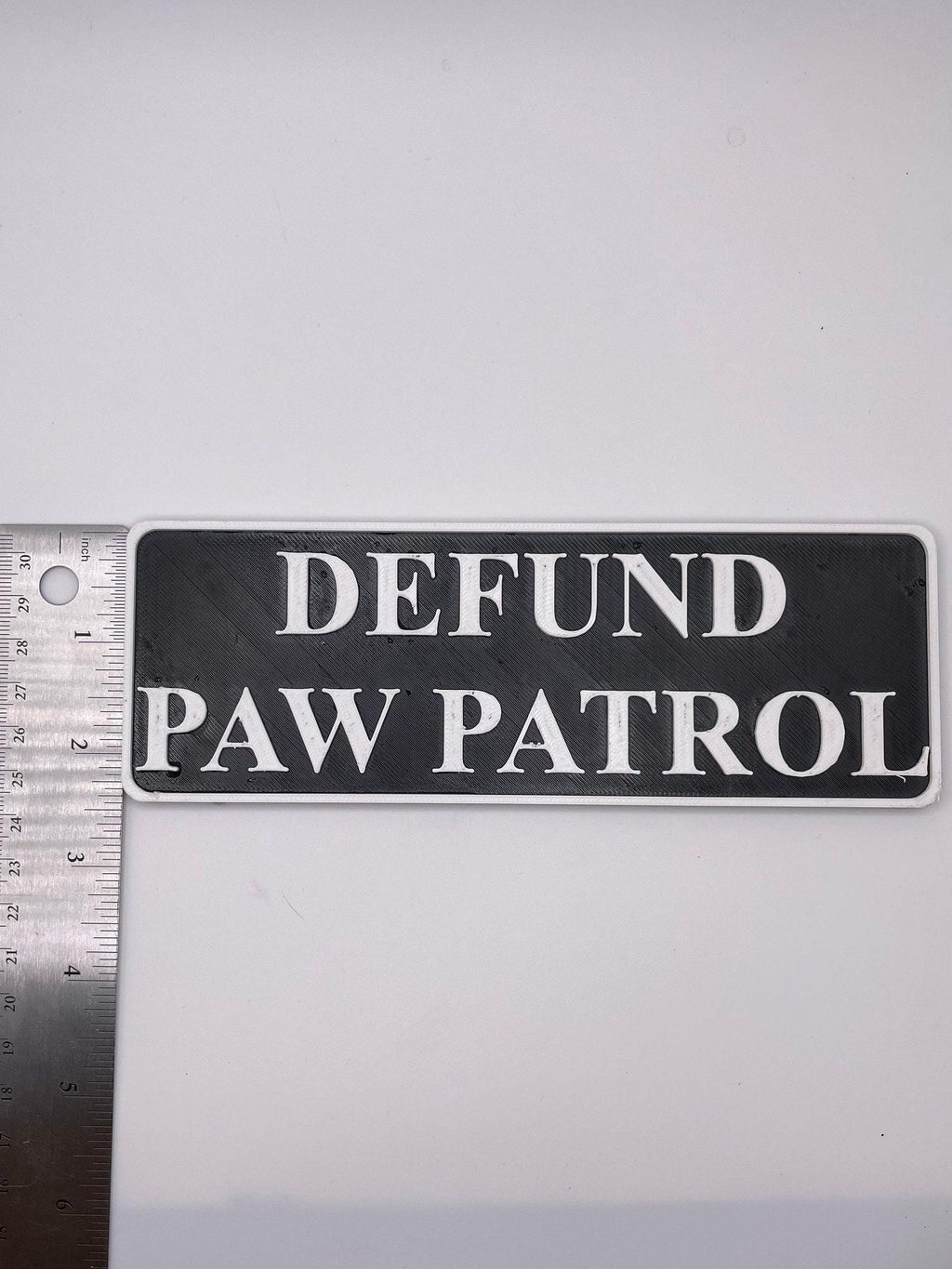 Defund Paw Patrol, Funny Magnetic Sign | PETg Rigid Magnet | 7in X 2.5in, Removable, Strong Hold